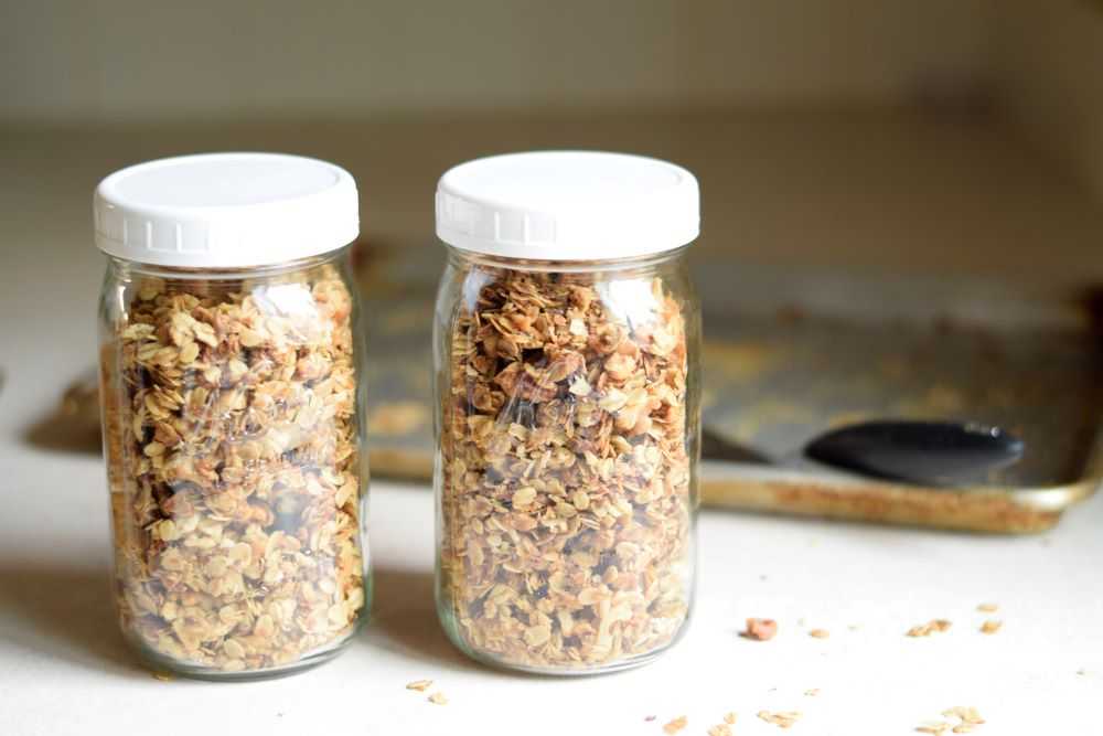 Homemade granola in two mason jars 
