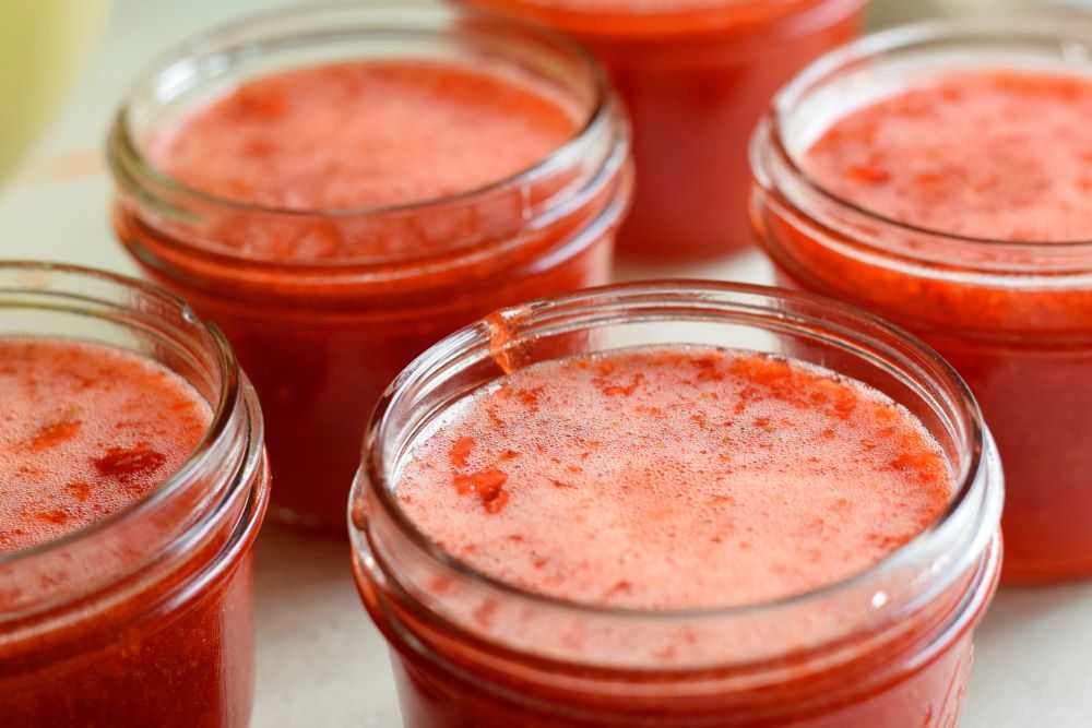 Strawberry freezer jam in jars.