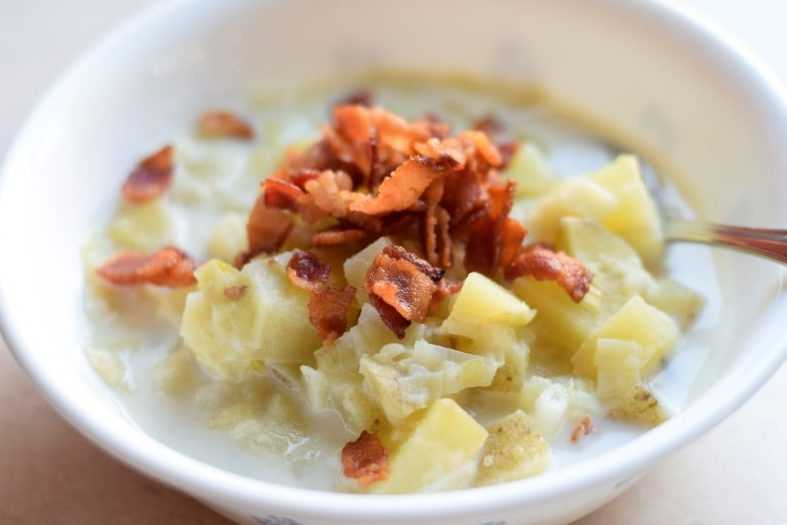 bowl of leek and potato soup with bacon