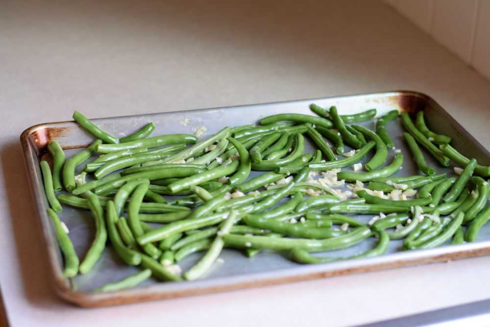 Green beans on a sheet pan.