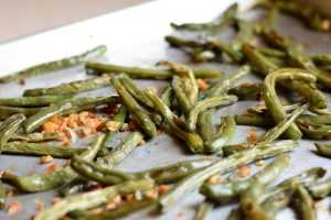 Garlic roasted green beans on a pan