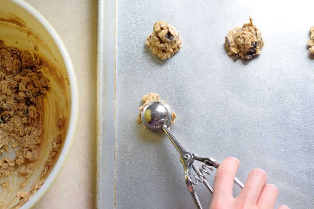 Drop the oatmeal raisin cookies onto a baking sheet