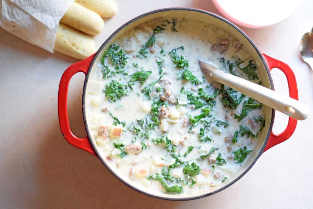 Sausage potato and kale soup, zuppa toscana with breadsticks