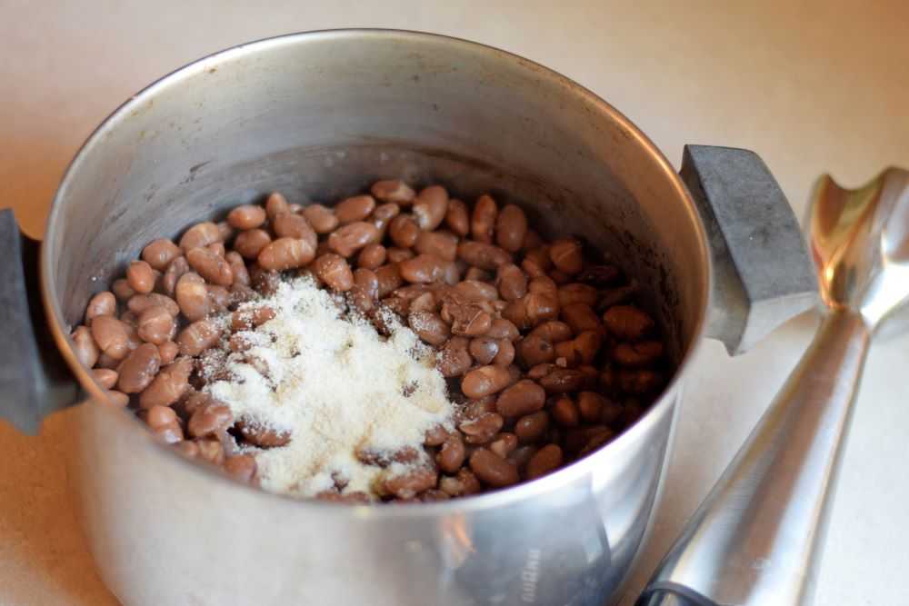 Add the onion powder to the cooked beans.