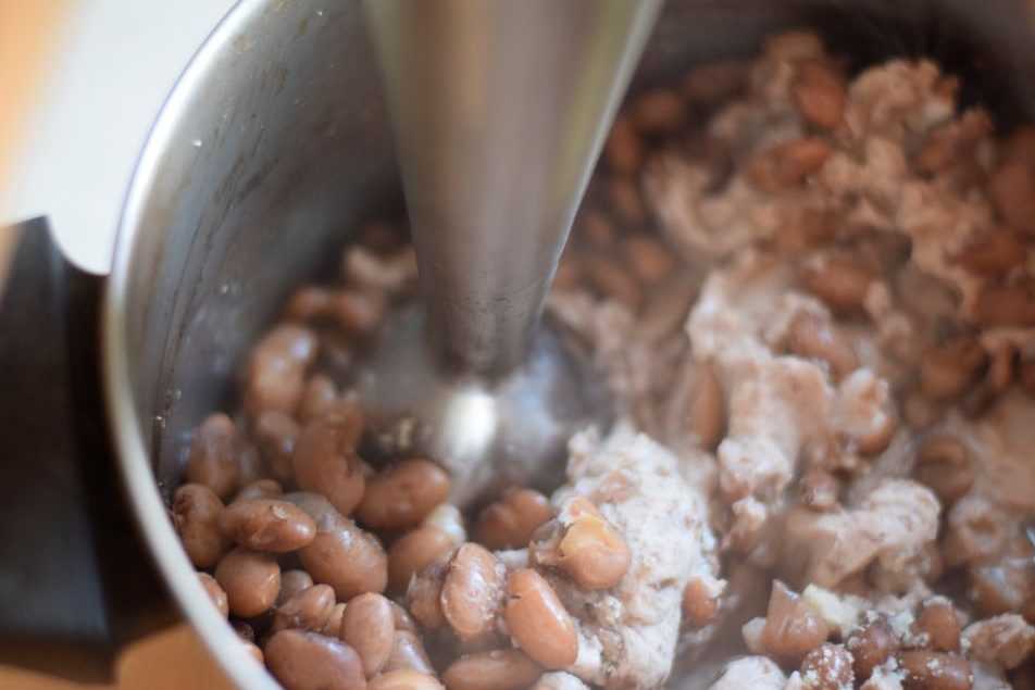 Mash the beans with an immersion blender.
