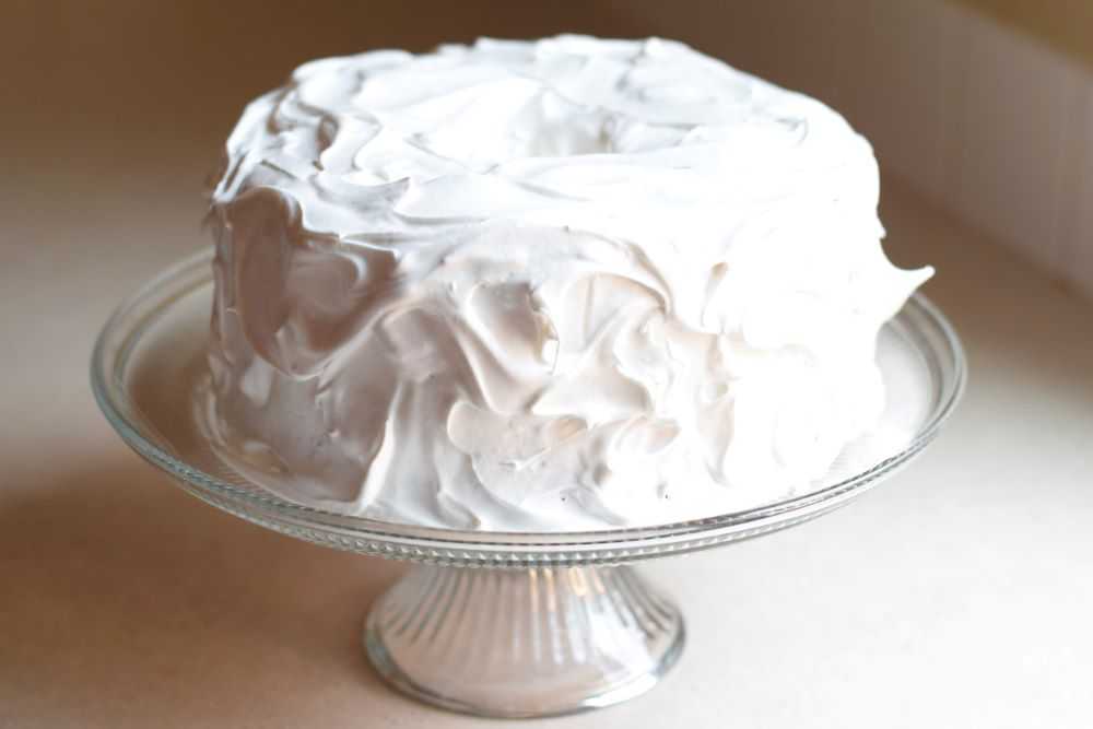 Cake frosted with fluffy white frosting