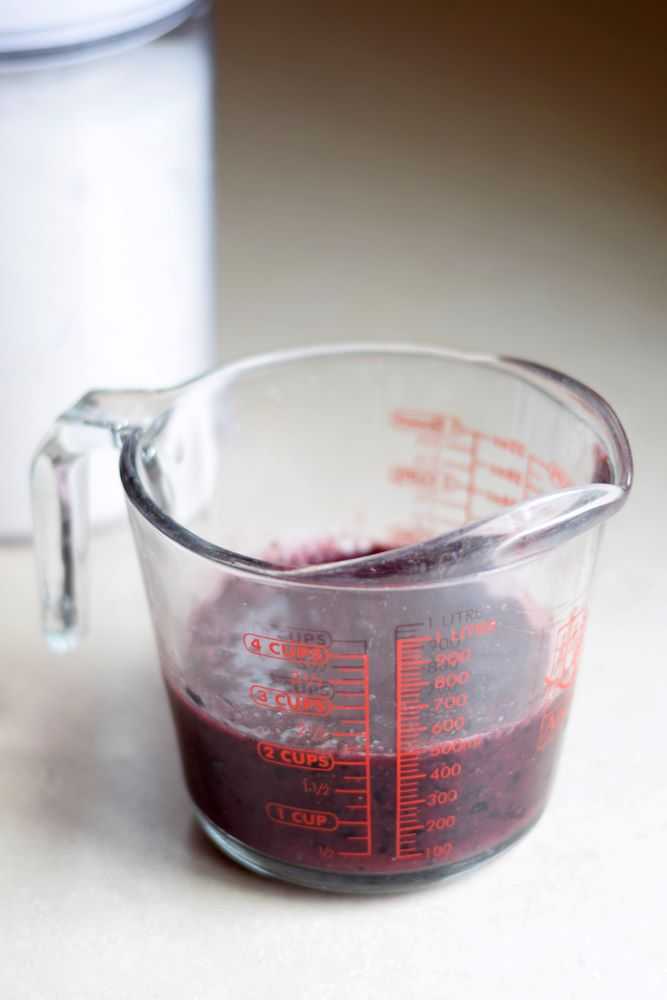 blueberry puree in measuring cup for blueberry jam